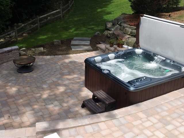 new paver patio with jacuzzi