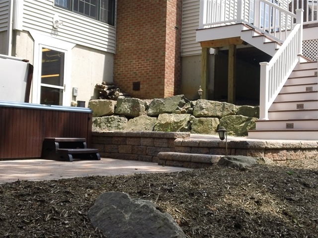 jacuzzi and stair construction with new patio